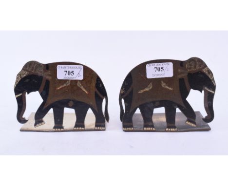 A pair of brass and enamel bookends, in the form of elephants, 11 cm high (2)