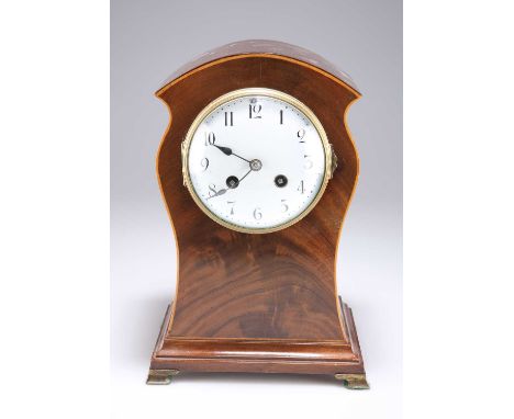 AN EDWARDIAN MAHOGANY MANTEL CLOCK the white enamel dial with Arabic numerals, French two-train movement. 26cm high