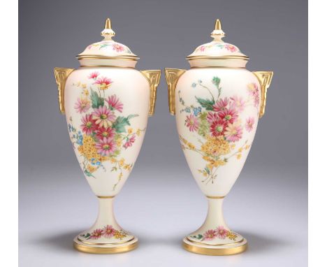 A PAIR OF ROYAL WORCESTER LIMITED EDITION BLUSH IVORY VASES AND COVERS each numbered 17 (of 200), boxed with certificates. (2