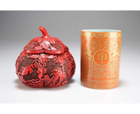 A CHINESE CINNABAR LACQUER BOX AND A CHINESE PORCELAIN BRUSH POT the box of gourd form, the brushpot cylindrical. (2) Brushpo