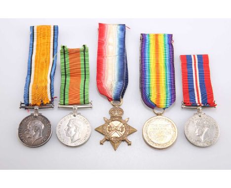 A GROUP OF MEDALS, WWI AND WWII comprising the 1914/15 Star, to 1371 DVR. J. EVERALL. R.F.A.; the British War Medal, to 1371 