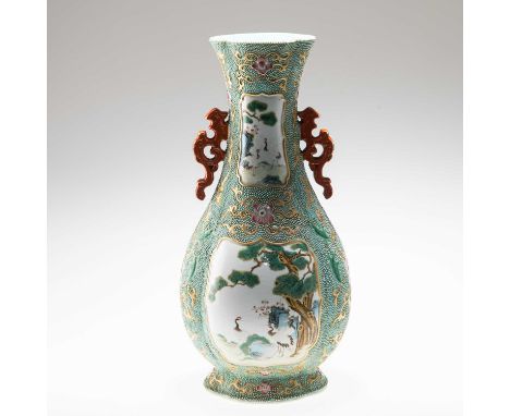 A CHINESE PEAR-SHAPED VASE late Qing, decorated with panels of cranes and ducks, bears iron-red seal mark. 35cm highIngrained