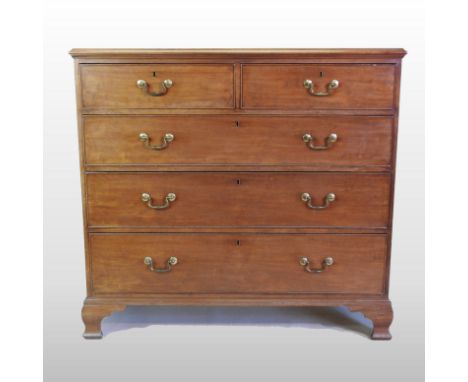 A George III mahogany chest, containing two short, over three long graduated drawers, on bracket feet, 114cm