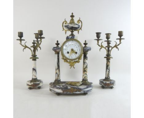 A 19th century French marble and ormolu mounted three piece clock garniture, of architectural form, surmounted by an urn, wit