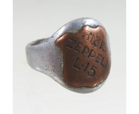 A World War I aluminium and copper signet ring, inscribed 31/316 Zeppelin L.15. This inscription appears to relate to the Fir