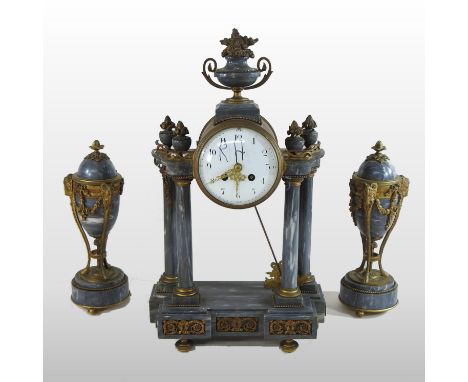 A 19th century French marble and ormolu mounted three piece clock garniture, of architectural form, surmounted by an urn, wit