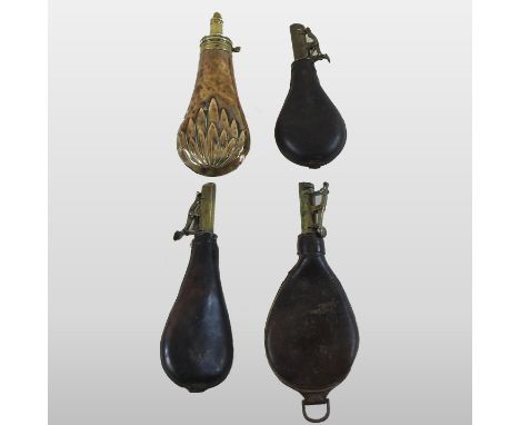 A 19th century brass Sykes powder flask, 19cm long, together with a collection of three various leather and brass powder flas