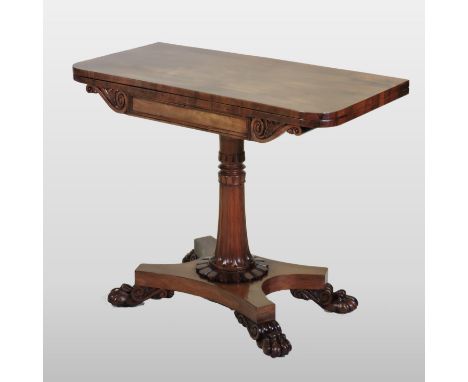 A William IV rosewood D shaped folding card table, on a fluted column and platform base, terminating in paw feet, 91cm