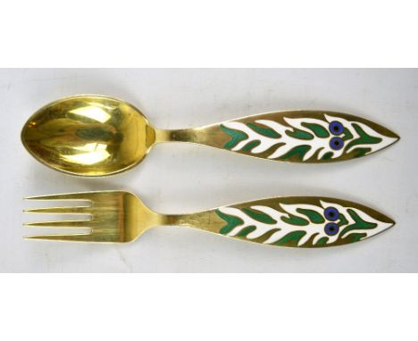 A MICHELSEN; a Danish sterling silver gilt and enamel decorated calendar spoon and matching fork inscribed '19 Jul 70', marke