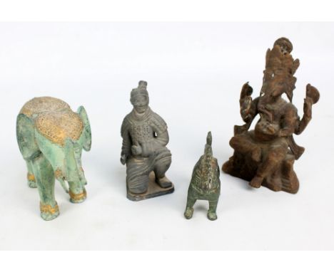 A group of Oriental items to include an Indian cast metal figure of seated Ganesh, height 16cm, a plaster figure of kneeling 