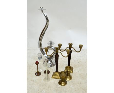 A collection of candelabra including a large chromed scrolling example, height 94cm (6).