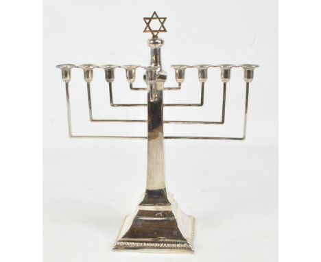 BRITTON, GOULD & CO; a George VI hallmarked silver Art Deco style Hanukkah menorah with angled branches and pierced Star of D