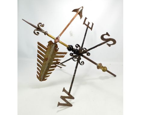 A cast iron weather vane, height 93cm, width 82cm. CONDITION REPORT: Extensive repairs, arrow section is a crudely made moder