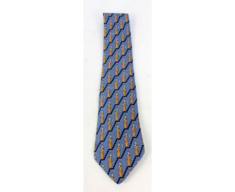 HERMÈS; a silk tie decorated with a woman on stairs carrying a pitcher motif on blue ground.