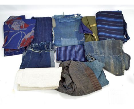 A quantity of Japanese textiles including boro, tie-dyed examples, etc.