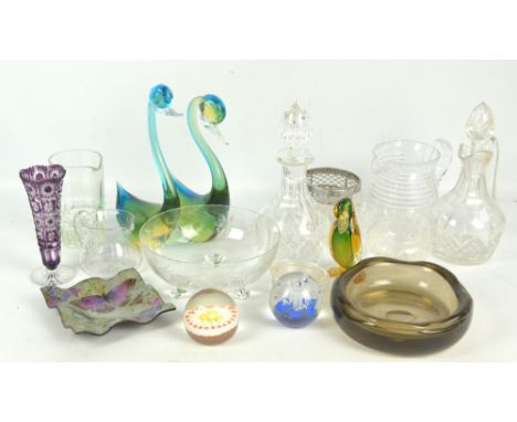 A small group of glass to include a pair of decorative multicoloured swans, a brown shaped circular bowl, two paperweights, a