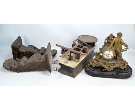 A pair of foliate and scroll carved corbels, height 41cm, a set of vintage scales with marble and wooden base, width 52cm, an