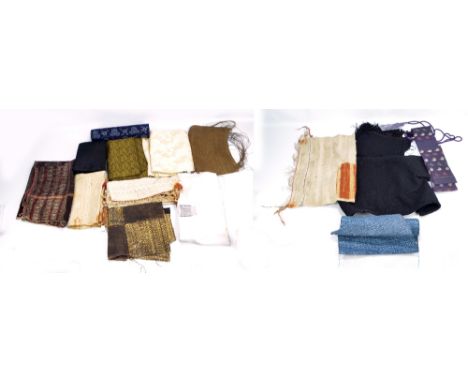 A woollen child's outer garment, a Japanese provincial tie-dyed panel and other predominantly provincial Japanese textiles.