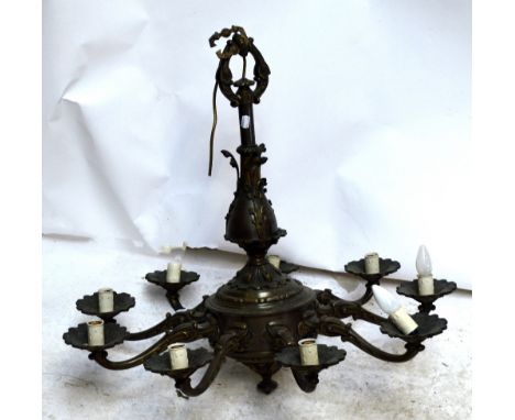 A brass nine branch chandelier, diameter 85cm, height approx 75cm.  CONDITION REPORT: Please note that this item is very heav