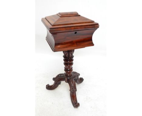 A William IV teapoy, the sarcophagus hinged lid enclosing a baize lined interior with two lidded containers above foliate car