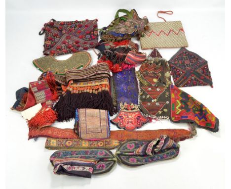 A quantity of predominantly Chinese provincial beadwork and embroidery including a Yao sash, two head pieces, a pair of shoes