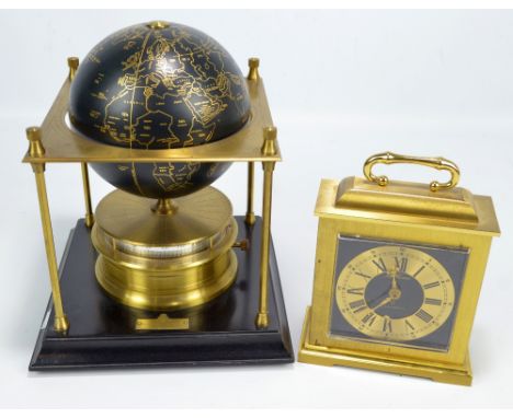 A brass Royal Geographical Society clock, 1980, height 28cm, and a 'Quartzmatic' mantel clock (2). CONDITION REPORT: It has i