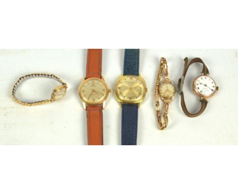 A mixed group of watches comprising two gentleman's gold plated Avia and Buren watches on leather straps, an unmarked yellow 