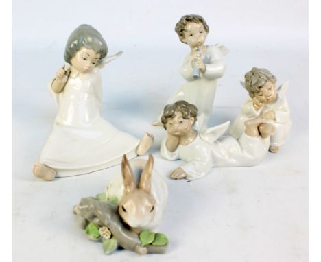 Four Lladro figures of cherubs in various poses and a figure of a rabbit (5).