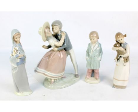 Three Lladro figures to include a boy in dressing gown and a girl holding a lamb and a figure group of boy kissing a girl (4)