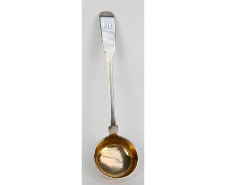 An early 19th century German silver fiddle pattern soup ladle with circular gilt washed bowl and initialled finial, marked fo