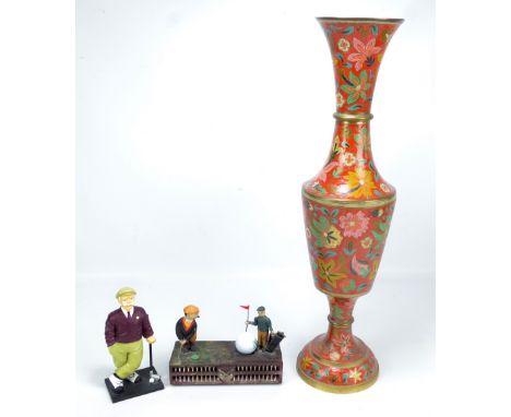 A cast iron 'Birdie Putt' mechanical money box, width 21cm, and a plaster figure of a standing golfer by Olympus Trophies, al