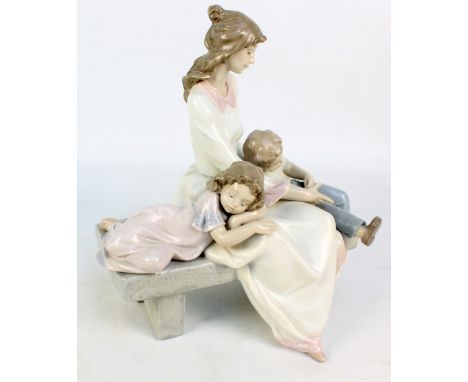 A Lladro 'Afternoon Nap' figure group, height 29cm. CONDITION REPORT: Appears ok with minor surface wear and dirt.