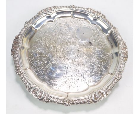 PAUL STORR; a George III hallmarked silver circular salver with cast gadrooned rim with foliate scroll and scallop motifs, th