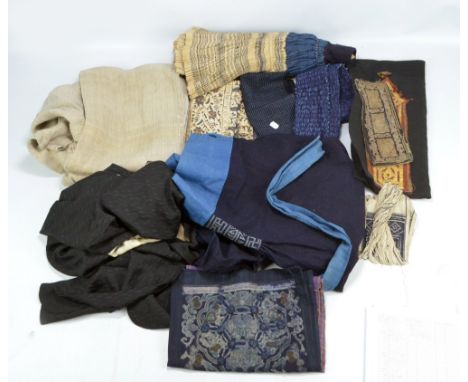 A quantity of Japanese textiles and garments including obi, dress, etc.