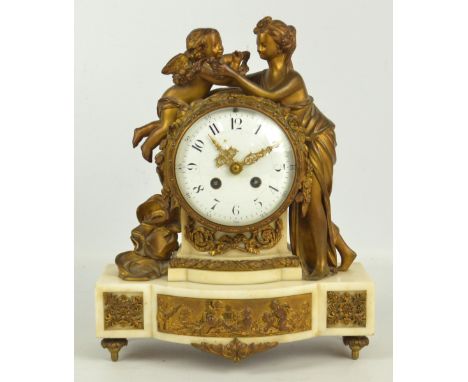 A 19th century French figural gilt metal mantel clock on rectangular marble base, the circular enamel dial set with Arabic nu