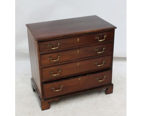 A small George III and later mahogany chest of four long drawers with bone escutcheons, on bracket feet, width 84cm.