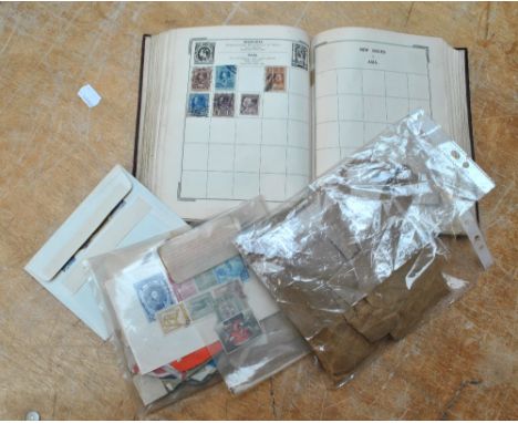 WORLD STAMPS, in an Improved album, mainly pre-1950 issues, plus a tin of loose, and India 1911 Durbar Post Office leaflet wi