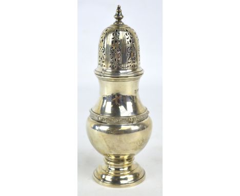 NORTHERN GOLDSMITHS CO;  an Edward VIII hallmarked silver baluster sugar caster with cast Celtic motifs band and domed pierce