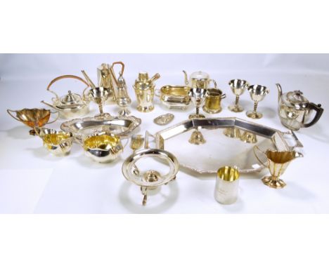 A quantity of electroplated items to include a twin handled tray with Celtic band decorated rim, a spirit kettle, a cocktail 