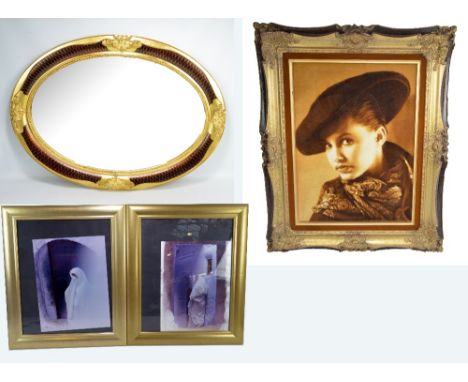 A contemporary gilt framed oval mirror, 50 x 74cm, a framed portrait printed on fabric of a woman in a hat, and a pair of fra
