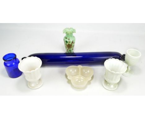 A small group of glass to include a Bristol blue salt/rolling pin, a pair of opaque white glass campana shaped vases, height 