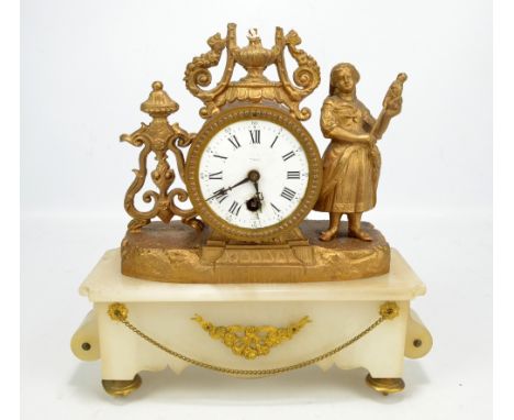 A 19th century French gilt metal thirty hour mantel clock, the circular enamel dial set with Roman hour markers, decorated wi