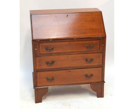 An Edwardian mahogany and inlaid bureau, the fall front enclosing fitted interior above three long drawers on bracket feet, w
