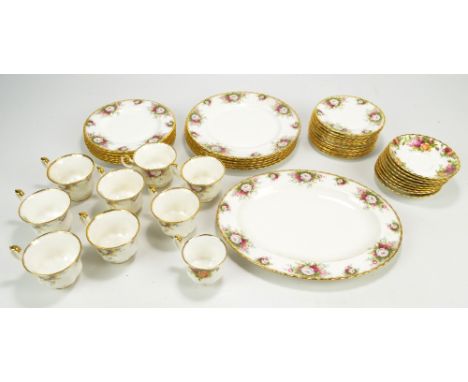 A Royal Albert 'celebration' paattern part tea set comprising eight cups and saucers, eleven small plates, six larger example