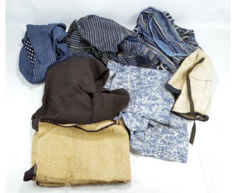 A quantity of Japanese textiles and garments including peasant haori, etc.
