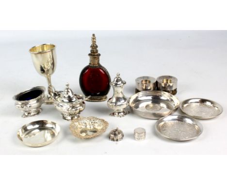 A group of predominantly hallmarked silver items including a three piece cruet set, Barker Bros, Chester 1908, height 12.5cm,