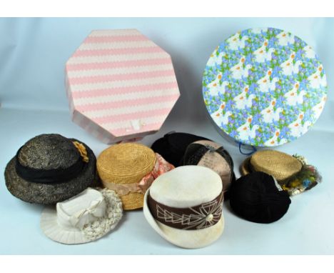 A collection of vintage hats including a mid to late 19th century boater style child's hat made of cream petersham ribbon dec