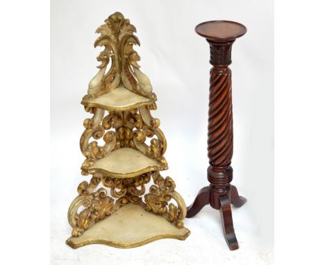 A Victorian mahogany wrythen twist torchère stand on tripod base, height 84cm and a gilt wood set of three serpentine fronted