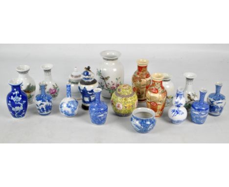 A small collection of various Chinese porcelain vases to include a pair of Republic style bottle shaped examples with flared 