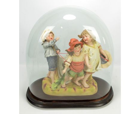 A Continental bisque figure group of children playing, height 35cm, on oval base with glass dome. CONDITION REPORT: Dome appr